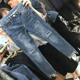 Kvinnors jeans mager rippade jeans kvinnor vår sommar höst heta säljer kvinnor mode casual flickor söta denim byxor kvinnlig billig grossist