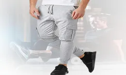 MEN039S PANTS MEN AUTURN WINTER CASUAR TIGHT SOLID MULTIPOCKER RUNSING SPORTS SWEATPANTSヒップホップハーレムジョガーズパンタローンズhomb1034761