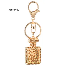 Fashion Design Key Ring Perfume Bottle Keychains Holder for Women Creative Crystal Rhinestone Diamond Metal Car Keyring Chain Bag Pendant Gift keychain