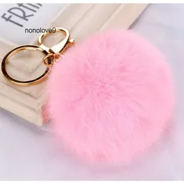 Portachiavi con palla di pelo reale di coniglio Palla di pelliccia morbida Portachiavi in metallo dorato adorabile Palla con pon pon Portachiavi in peluche Portachiavi per auto Borsa Orecchini Accessori Portachiavi con ciondolo