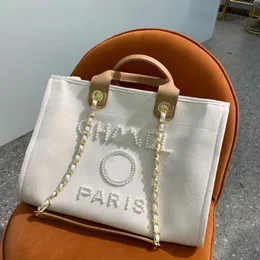 Designer Fashion Classic Evening Bags Luxury Ch Handbag Pearl Brand Label Backpack Womens Beach Handbags Purse Women Canvas Hand B310W