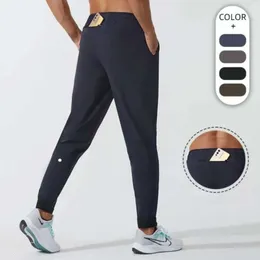 2024 lululemenI Calças Homens Mulheres Homens Jogger Calças Longas Esporte Yoga Outfit Secagem Rápida Com Cordão Bolsos de Ginásio Calças de Moletom Masculino Casual Cintura Elástica Fiess 698f