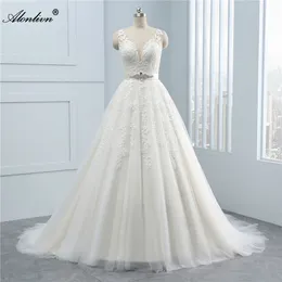 Elegante abito da sposa a trapezio senza maniche con scollo a V Appliques in pizzo Sliky tulle Fusciacche con perline Abiti da sposa senza schienale possono essere personalizzati