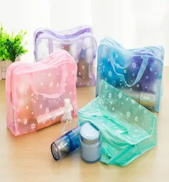 Whole ChinaMakeup Bags Cosmetic Bags Transparent Waterproof PVC Bag Floral Print For Toilet Bathing Pouch Travel E0043143480