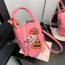 2024 Nuova borsa a secchiello a tracolla con tracolla divertente per ragazza cartone animato di Halloween 2024 Borsa piccola a forma di zucca portatile all'ingrosso in magazzino