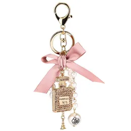 Lanyards Fashion Imitation Pearl Perfume Bottle Keychain Car Key Ring Women Bag Charm Accessories Cute Bow Key Chain Creative Keyrings G1019