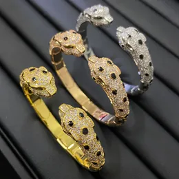 DHgate.com:Premium Cheetah Bracelet: 18K Gold Plated Bangle
