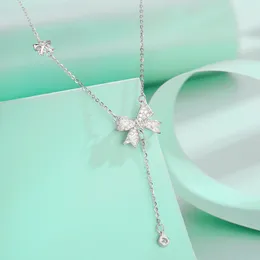 Silver necklace female China-Chic minority bow pendant full of diamonds tassels temperament personality collar chain jewelry