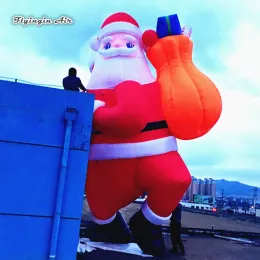 5 أمتار الارتفاع في الهواء الطلق الإضاءة الحراس القابل للنفخ سانتا كلوز يحمل مبنى هدايا تسلق كيس لزينة عشية عيد الميلاد