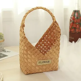 Einkaufstaschen, reines handgewebtes Holzstück, handgehaltene Blumenkorb-Arrangement, Aufbewahrungsverpackung