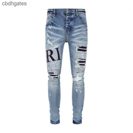 Broderi amiirii lila jeans män mode jean 2023 demin brev perforerat patch mode trend mäns