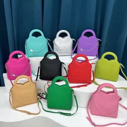 Klassisk New York Designer Tote Bag Leather Pu TC Axelväskor Koppling Handväska Crossbody Bag Candy Color Messenger Package Bucket Messenger Package Evening Bags T024