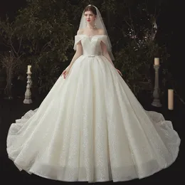 2023 sexy arabische Ballkleid-Hochzeitskleider in Übergröße, herzförmige, glänzende Brautkleider, glitzernde Luxus-Perlen-Pailletten-Hochzeitskleider, Sweep-Zug, Boho-Applikations-Brautkleider