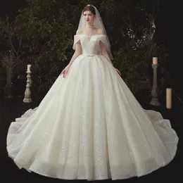 2023 Abiti da sposa sexy arabi con abiti da ballo Plus Size Sweetheart Abiti da sposa lucidi Bling Luxury Perline Paillettes Abiti da sposa Sweep Train Boho Applique Abiti da sposa