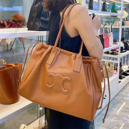 Designer Shopping Tote Bag Women's leather new high capacity commuter shoulder Underarm bag Clearance Wholesale side drawstring handbag