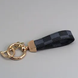 مصمم بوري جلود مفتاحية فاخرة مفاتيح سبيكة الزنك سبيكة Keyring Womens Buckle Loves Classicite Gold Gold Black Car Meta C0UU#