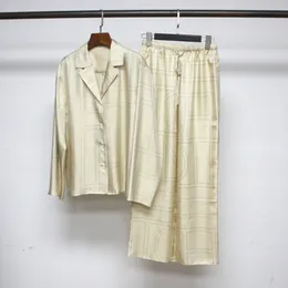 Camicia da donna in twill di seta ricamata Top / pantaloni Toteme
