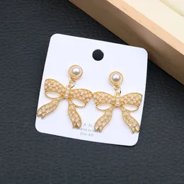 Bow Pearl Dangle Kolczyki Marka Letter Stud Kolczyki projektant biżuterii luksusowe kolczyki damskie akcesoria biżuterii