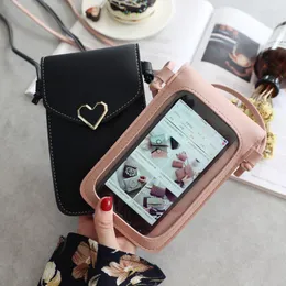 Axelväskor lyxiga handväskor kvinnor designer hjärtformad transparent enkel retro mobiltelefonpåse 2023 spänne