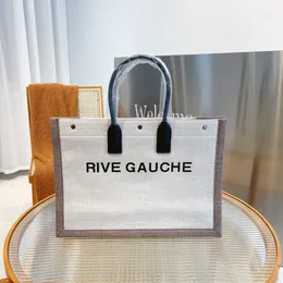 حقيبة التسوق حقيبة مصممة عالية الجودة رفاه اليد الفاخرة نهر Gauche Handbag Summer Rafia Linen Beach Bag Travel Canted Handbag Fashion Bag 01