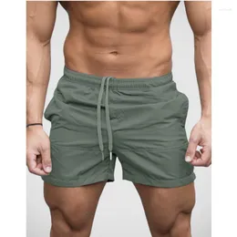 Mäns shorts finns i Europa och USA: s strandkläder modetrend