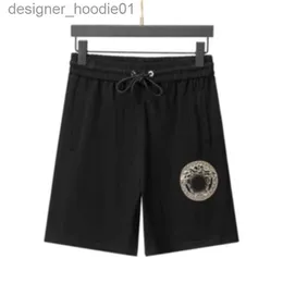 Kvinnors shorts 2023 sommar ny mode fast färg över knä fem kvart byxor tryckt bokstavs avslappnade shorts elastiska midja m-xxxl l230912