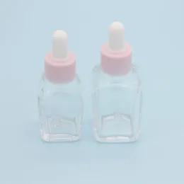 20 ml Essential Oil Square Droper Bottle 30 ml Clear Glass Serum -flaskor med rosa mössa för kosmetisk roqle