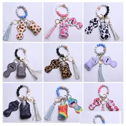 12 Colors Wooden Tassel Sile Bead String Bracelet Keychain Bag Car Key Chain Wristband Hand Sanitizer Holder With Bottels For Woment Fashion