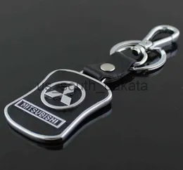 Schlüsselringe 5pcslot Top Fashion Car Schlüsselkette für Mitsubishi Metall Lederschlüsselringschlüsselkette Ring Llaveros Chaveiro Car Emblem Key Holder6357931 x0914
