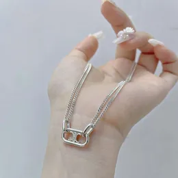 Japan Sydkorea dubbelskiktad båge de triomf krage kedja S925 sterling silver ins nisch design halsband med en cool och minimalistisk känsla