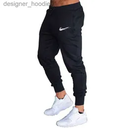 Calças masculinas roupas masculinas jogger calças de basquete homens fitness musculação ginásios para corredores homem treino preto sweatpants designer calças casuais 3xl l230915