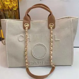 50% de desconto na liquidação Bolsa de mão clássica feminina de luxo Bolsa de praia de lona Bolsas grandes mochilas capacidade pequena corrente pacotes grande crossbody FZZW 12KZ modelo 258