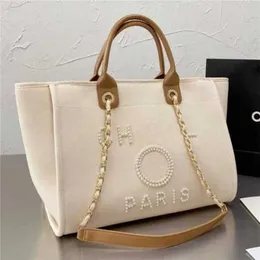 Barato 80% de desconto feminino luxo clássico mão lona bolsa de praia bolsas grandes mochilas capacidade pequena corrente pacotes grande crossbody código IBMU 561