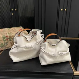 Damen Designer Flamenco Clutch Bag Premium Rindsleder Marke Cloud Bags in vielen Farben Luxus Umhängetasche Lucky Bag Mini Bucket Bags 230915