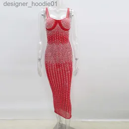 Grundläggande avslappnade klänningar Kricesseen Sexig paljett glitter kristall midi klänning vestido kvinnor ärmlös rem bodycon se genom festklubbklänningar tjej l23091