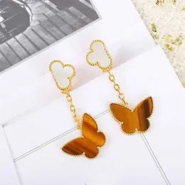 S925 Silver Top Quality Flower One Flower and Butterfly Shape Clip arring مع قذيفة بيضاء وحجر نمر للنساء مجوهرات الزفاف GIF275M