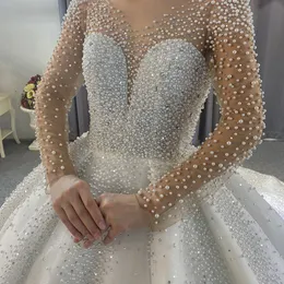 Luxury Puffy Wedding Dresses 2023 O-neck Beading Pearls Crystal Illusion Long Sleeves Bride Party Gowns Arabic Dubai Vestido De Novia