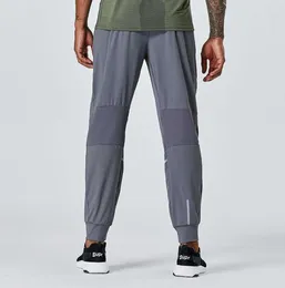 Designer calças compridas homens lulus esporte correndo alinhar yoga ao ar livre ginásio bolsos fino ajuste sweatpants lu pant jogger calças casuais elástico lululemenly designer pousio