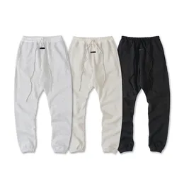 Autumn Winter USA Europe 7th Leather Logo Pocket Pants Byxor Modemän Kvinnor Cement White String Joggers Sweatpants202a