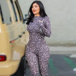 Kvinnors Jumpsuits Rompers tryckt Jumpsuit Kylie -stil med elastisk fingerslinginformation på ärmarna Fashion Zebra Stripe Crewneck Khloe Kardashian Catsuit 230919