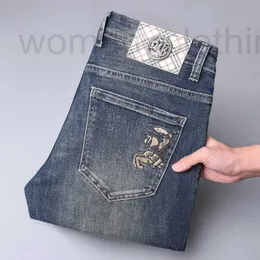 Herren Jeans Designer 2023 Neu für Light Luxury Korean Edition Dicke elastische Füße Slim Fit Jugendhose 6MMS