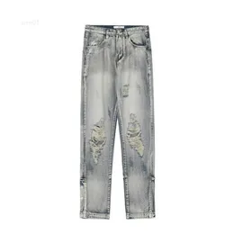 Trendowa marka High Street Umyj stare żebra boczne ze złamanymi mączkowymi dżinsami z prostym rękawem, bombardowane żebrakowe spodnie7kqn