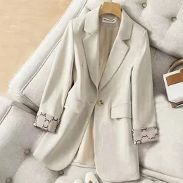 Kvinnors designer blazer jacka kappa kostym tidvatten varumärke retro designer ren färg tunt avslappnad serie jacka ett korn av spänne smal plus storlek lyxkvinnajacka