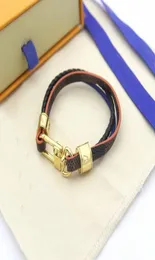 Bracciale in pelle di design per uomo donna marchio di gioielli di lusso braccialetti in oro ciondolo con chiusura femminile braccialetto di moda elegante di fascia alta 1568932