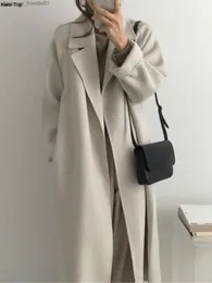 Women's Wool Blends Winter Elegant Long Woolen Coat för kvinnor Vintage hackad lapelöverrock med Belt Female Fashion Cardigan 2023 Nya kläder L230920