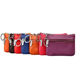 Sacos de armazenamento 10x7cm couro macio zip moeda bolsa mini carteira com chaveiro zíper bolsa mulheres 5500 q2 gota entrega casa jardim casa dhaw9