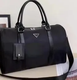 2023 Borse da viaggio di alta qualità del progettista Borse di moda in nylon nero Borsone di grande capacità Bagagli da viaggio Borsoni da uomo di lusso Borsa da viaggio per bagagli