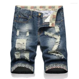 Jeans da uomo 2023 Pantaloncini di jeans traforati versatili alla moda per uomo con bordi frastagliati e
