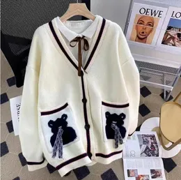 Maglioni con orsetto scozzese stile preppy da donna a maniche lunghe con scollo a V maglione di design taglie forti da donna elegante cardigan lavorato a maglia