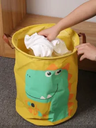 En hopfällbar tvättkorg för baby dinosaurier